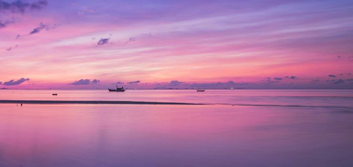 Green Boat With Oars on Both Side during Golden Hour Panoramic Photography